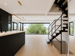 Cocina negra con isla – reforma integral de chalet en Los Peñascales, Torrelodones