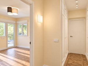 Estancia de la planta baja en la reforma integral de un chalet en Las Rozas